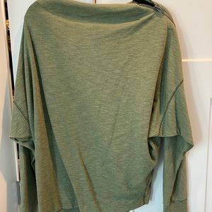 Green sweatshirt with shoulder zipper